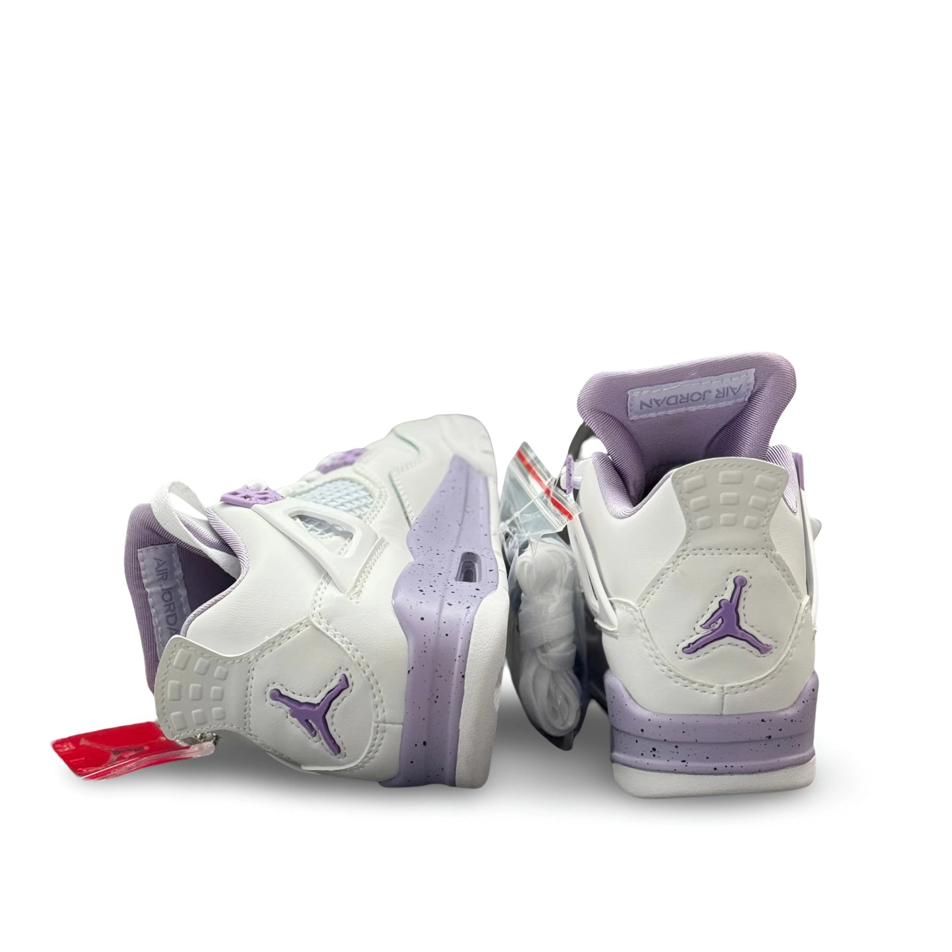 Air Jordan 4 White Purple Oreo rear view showing purple Jumpman logo and lilac speckled midsole.