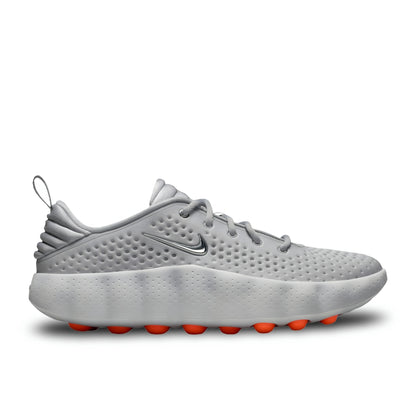 Nike Mind 002 grey orange sneakers angled view