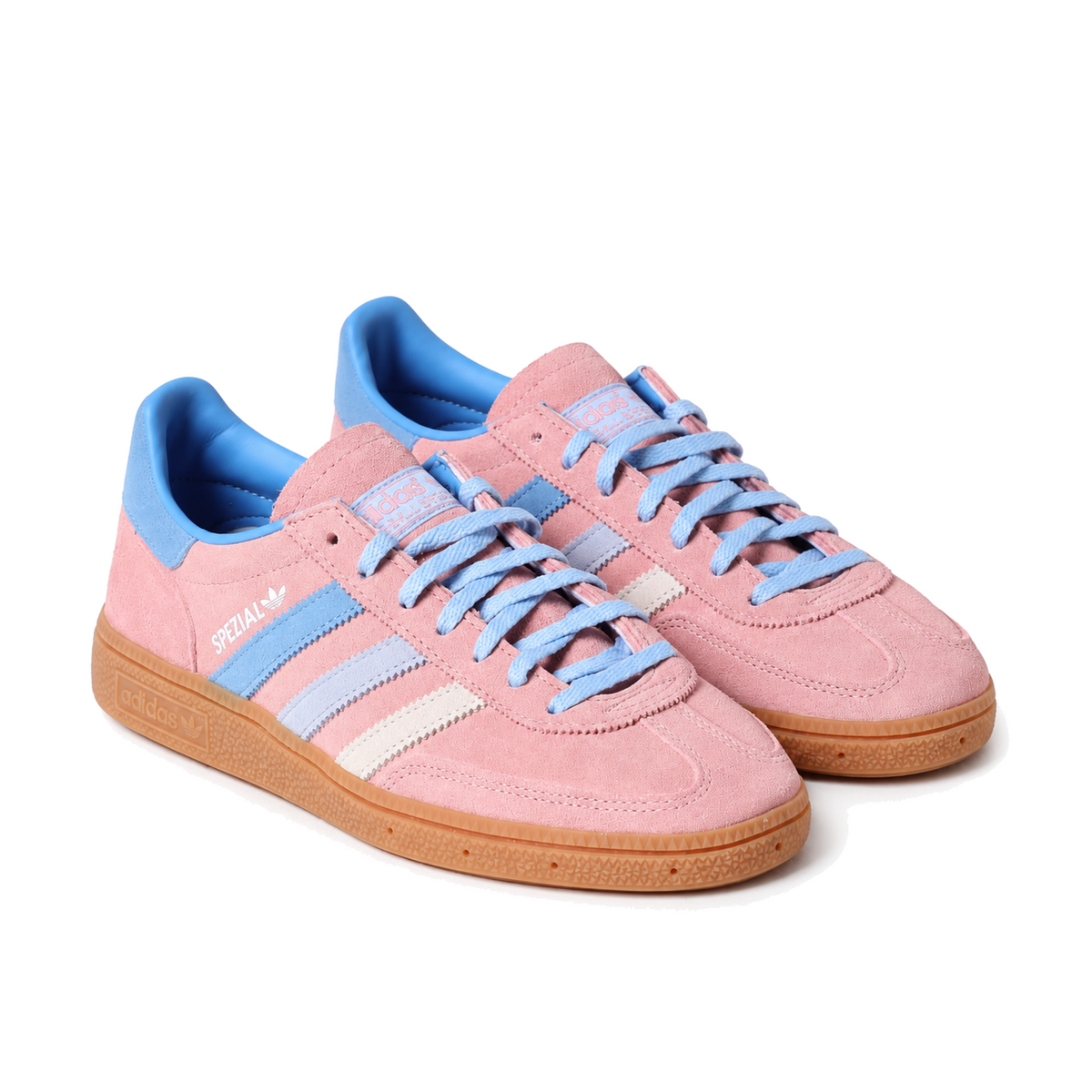 Front three-quarter view of the pink and blue adidas Handball Spezial pair showing lace-up uppers and rounded toes