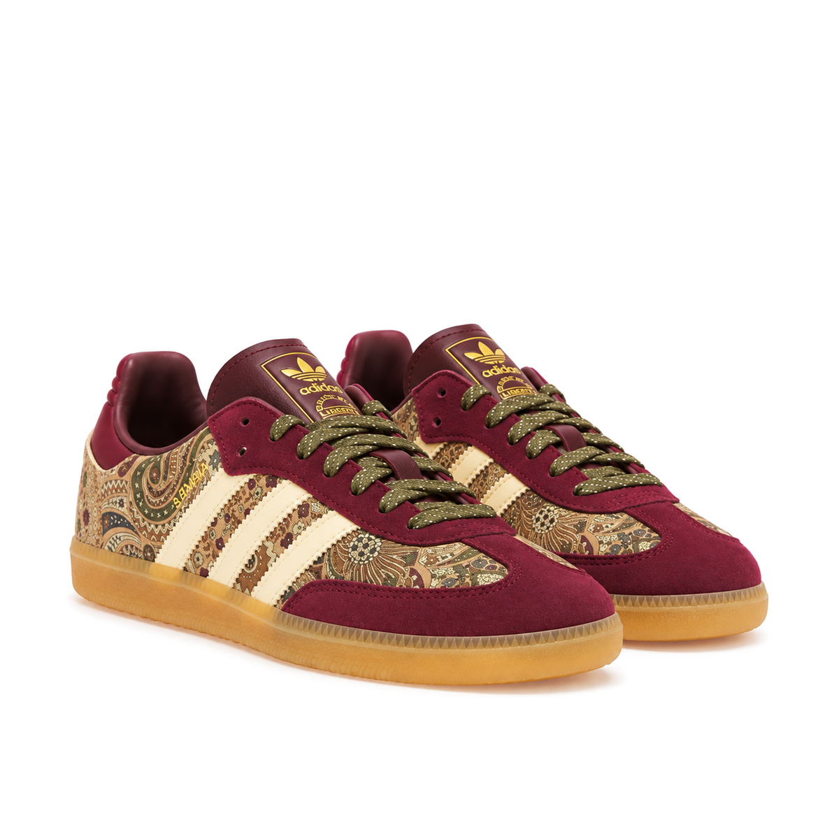 Front three-quarter pair of maroon Liberty London Samba OG sneakers showing olive laces and gold tongue branding