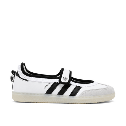 Right-facing side view of women’s adidas Samba Jane Ruffle in white and black, with white frills, silver Trefoil and a pale translucent sole.