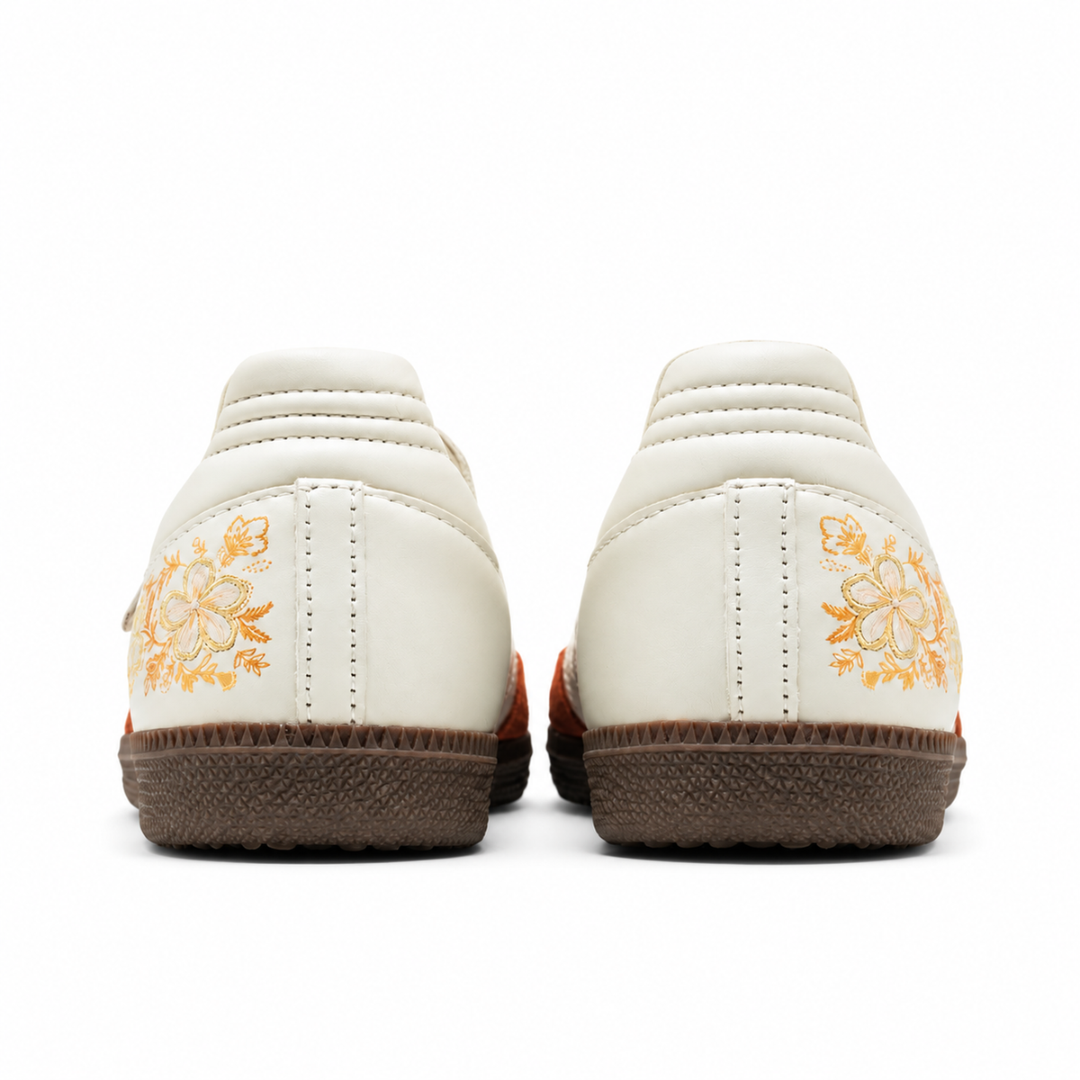 Rear view of Adidas Samba Jane Summer Glow shoes showing gold floral embroidery and dark gum soles