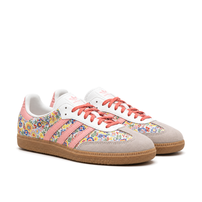 Right-facing front three-quarter pair of adidas Samba OG Liberty London Floral Embroidery with coral laces and light grey toe overlays