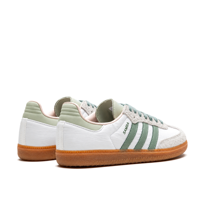 Rear three-quarter pair of adidas Samba Silver Green showing pale green ridged heels and white rear seams