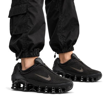 Nike Shox TL Winterized Black and Cave Stone unisex sneakers worn on white